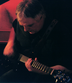 Eric Hopper plays guitar
